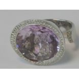 A unique 18ct white gold diamond and pink amethyst cocktail ring,