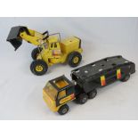 A vintage Tonka car transporter, together with a Tonka Turbo-Diesel digger. Two items.
