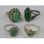 A 9ct gold and silver ring having central green banded cabachon surrounded by white stones, size L.