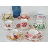A set of six Royal Worcester Connoisseur Collection cups and saucers; Worcester Flowers, Game Birds,