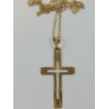 A 9ct gold cross pendant hallmarked 375, 3.
