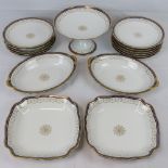A quantity of C. Ahrenfelot Limoges dinner wares including; two square shaped serving dishes,