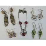 Three pairs of silver earrings; rose quartz, peridot and amethyst.