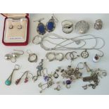 A quantity of assorted silver and white metal jewellery including; floral engraved lapel stud,