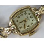 A vintage ladies Bulova cocktail watch having 10 K rolled gold watch head,