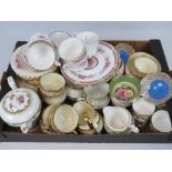 A large quantity of bone china tea wares; cups, saucers, side plates, cake plates, trios, etc.