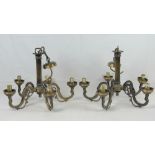 A pair of five sconce ceiling lights.