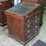 A Victorian elm and pollard oak Davenport desk with sliding top,