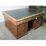A 19th century mahogany partners desk having twin frieze drawers to each side,