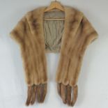 A fine quality vintage mink fur stole having silk lining with elasticated pocket and detachable