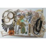 A quantity of assorted costume jewellery including;