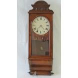 A Victorian 8-day wall clock with white painted dial having Roman numerals,