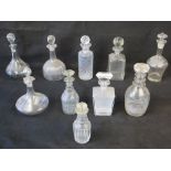 A quantity of late 19th and 20th century decanters, all having stoppers,