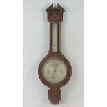 A good rosewood two glass aneroid barometer with thermometer over, strung with brass throughout,