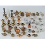 A quantity of assorted dolls house items including miniature tea sets, kettles, gramophones,