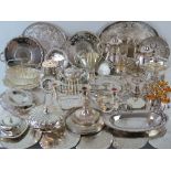A large quantity of silver plated wares including; set of coasters, six small goblets, toast rack,