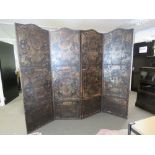 A fine embossed leather and studded three fold four sectional free standing screen,