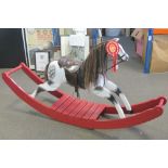 A traditional style dappled grey rocking horse,