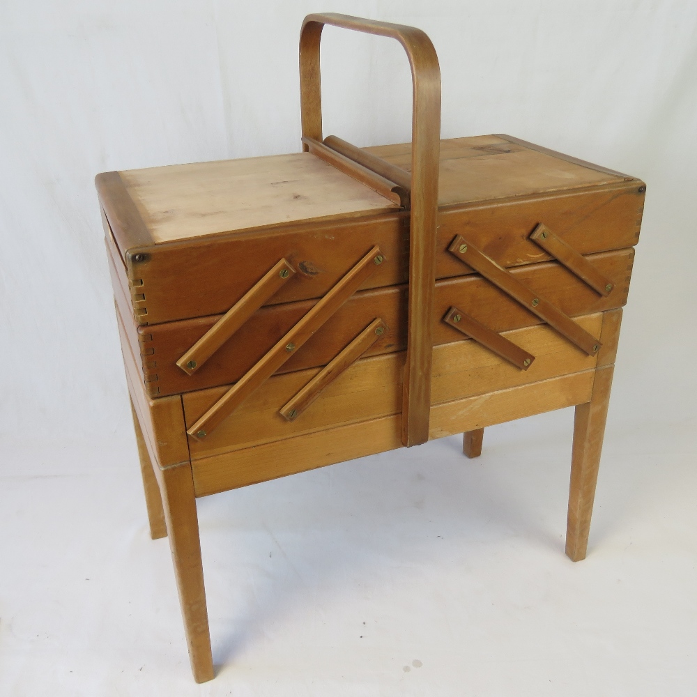 A vintage cantilever sewing box having three tiers and over handle, - Image 2 of 2