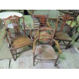 Four chairs; two individual rush seated chairs and two individual elm seated chairs,