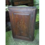 A late Georgian mahogany inlaid hanging corner cabinet,