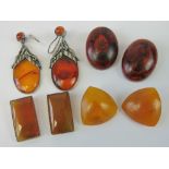 A pair of large white metal and Baltic amber earrings approx 7cm from top of hook,