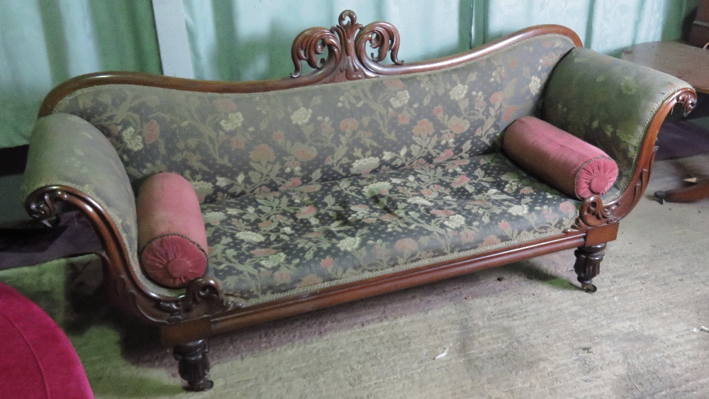 A superb 19th century mahogany and rosewood framed scroll armed settee having central pierced and