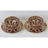 Two Royal Crown Derby Old Imari cups with saucers.