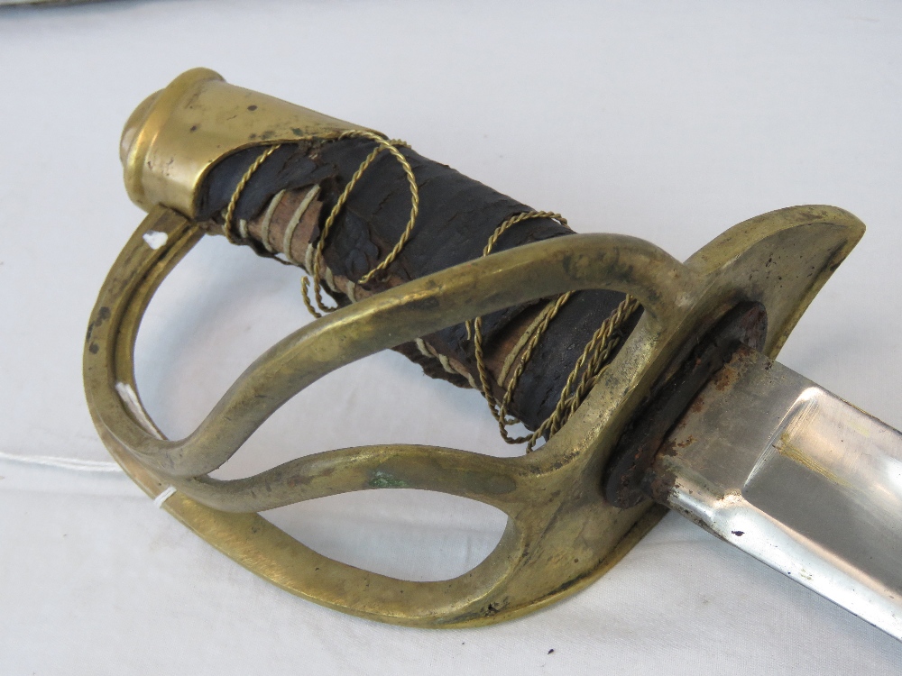 A 19th century French Cavalry sabre having wire bound grip a/f and decorative brass knuckle guard, - Image 3 of 4