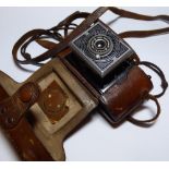 An Agfa Karat camera in original leather case inscribed "LIEUT H.F. NORTH, R.I.A.S.C, DELHI 1941".