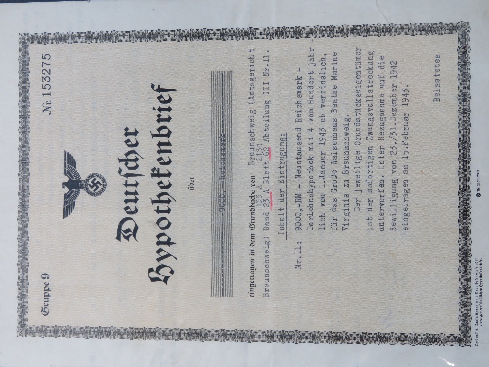 A quantity of WWII German documents and paper ephemera including;