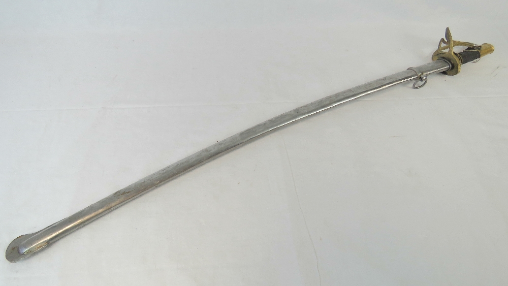 A 19th century French Cavalry sabre having wire bound grip a/f and decorative brass knuckle guard,