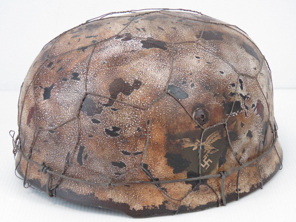 A fine replica WWII Luftwaffe Paratroopers Fallschirmjäger helmet with two decals, - Image 2 of 3