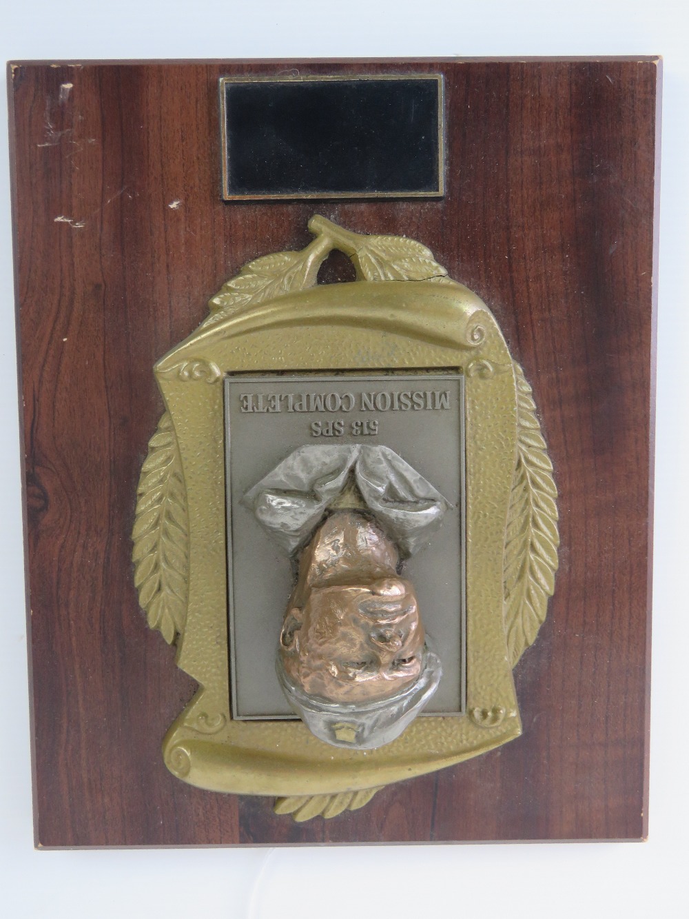 A 513 SPS Commando 'Mission Complete' plaque, unengraved, a/f.