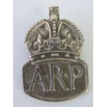 A HM silver ARP lapel badge, hallmarked London 1938.