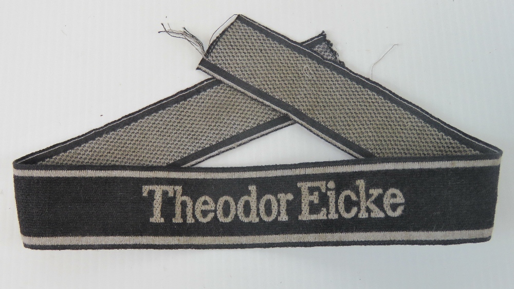 An SS tunic cuff title, Theodore Eiche (