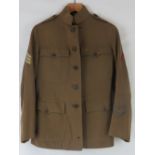 A WWI US military tunic and trousers wit