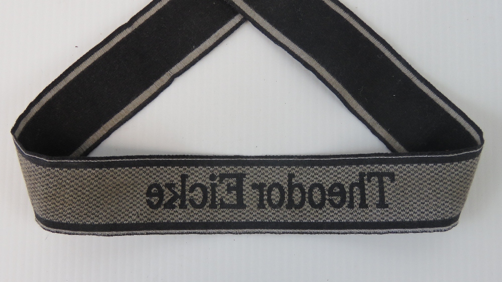 An SS tunic cuff title, Theodore Eiche ( - Image 2 of 2