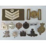 A bakelite Royal Engineers badge, an RCM
