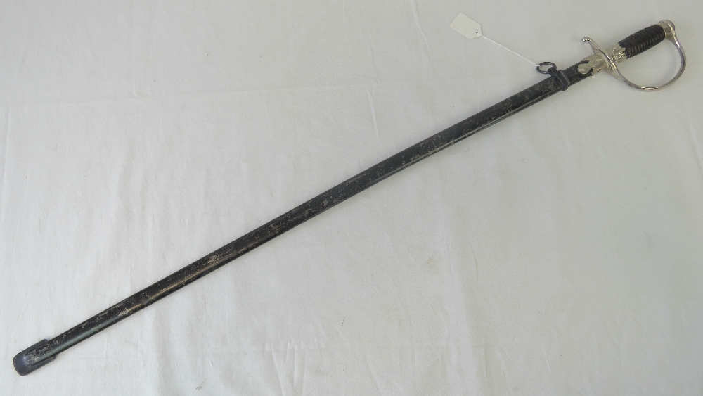 A WWII German SS NCOs sword complete wit