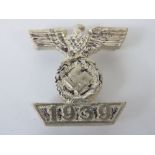 A WWII German Iron Cross Bar badge.