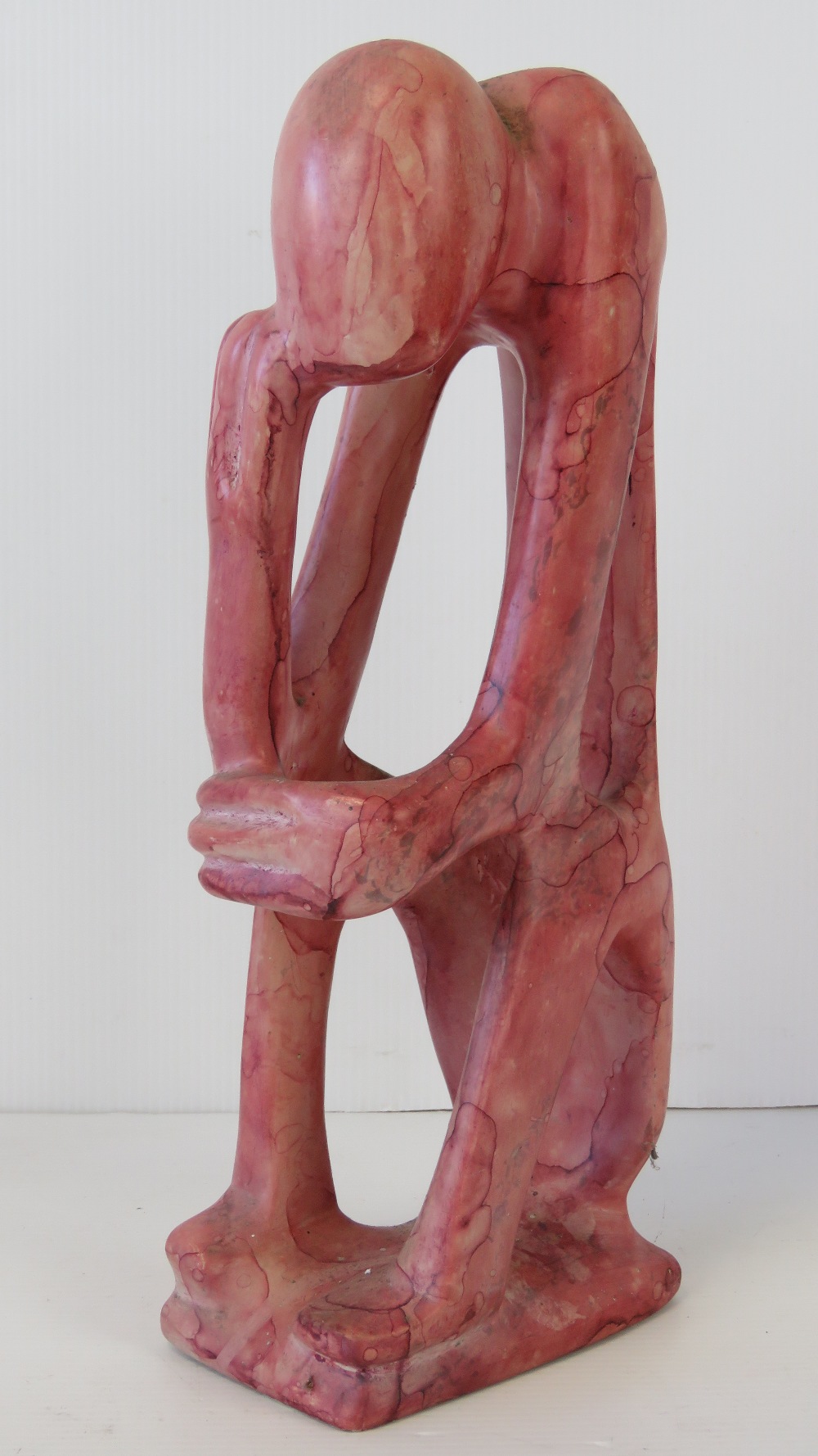 A contemporary abstract pink marble figu