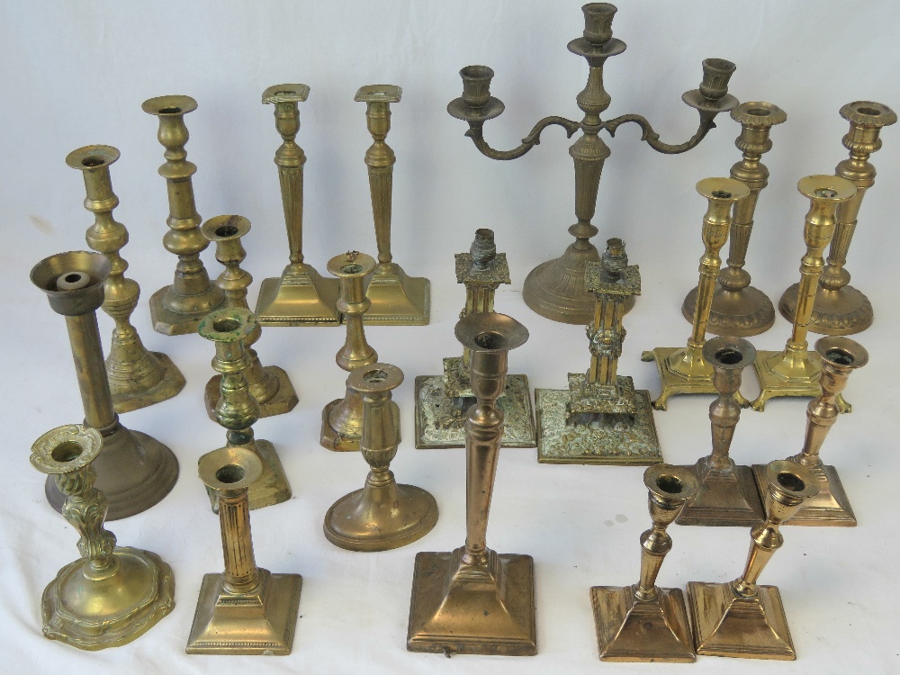 Three 18thC brass candlesticks, a pair o