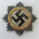 A WWII 'Gold' German Cross badge, pin st