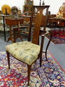 AN EARLY 20th.C.ART NOUVEAU MAHOGANY AND INLAID HIGH BACK ARMCHAIR.