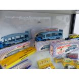 SEVEN DINKY 982 CAR TRANSPORTERS, FIVE WITH LOADING RAMPS TOGETHER WITH FOUR DINKY CARS.