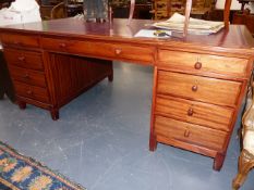 A GOOD QUALITY MAHOGANY LARGE TWIN PEDESTAL WRITING DESK WITH TOOOLED RED LEATHER INSET TOP. W.183 x