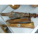 AN UNUSUAL AFRICAN HUNTERS OR FISHERMANS FETISH. IRON SPIKED WOODEN SHAFT WRAPPED IN ANIMAL SKIN AND
