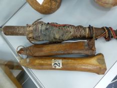 AN UNUSUAL AFRICAN HUNTERS OR FISHERMANS FETISH. IRON SPIKED WOODEN SHAFT WRAPPED IN ANIMAL SKIN AND