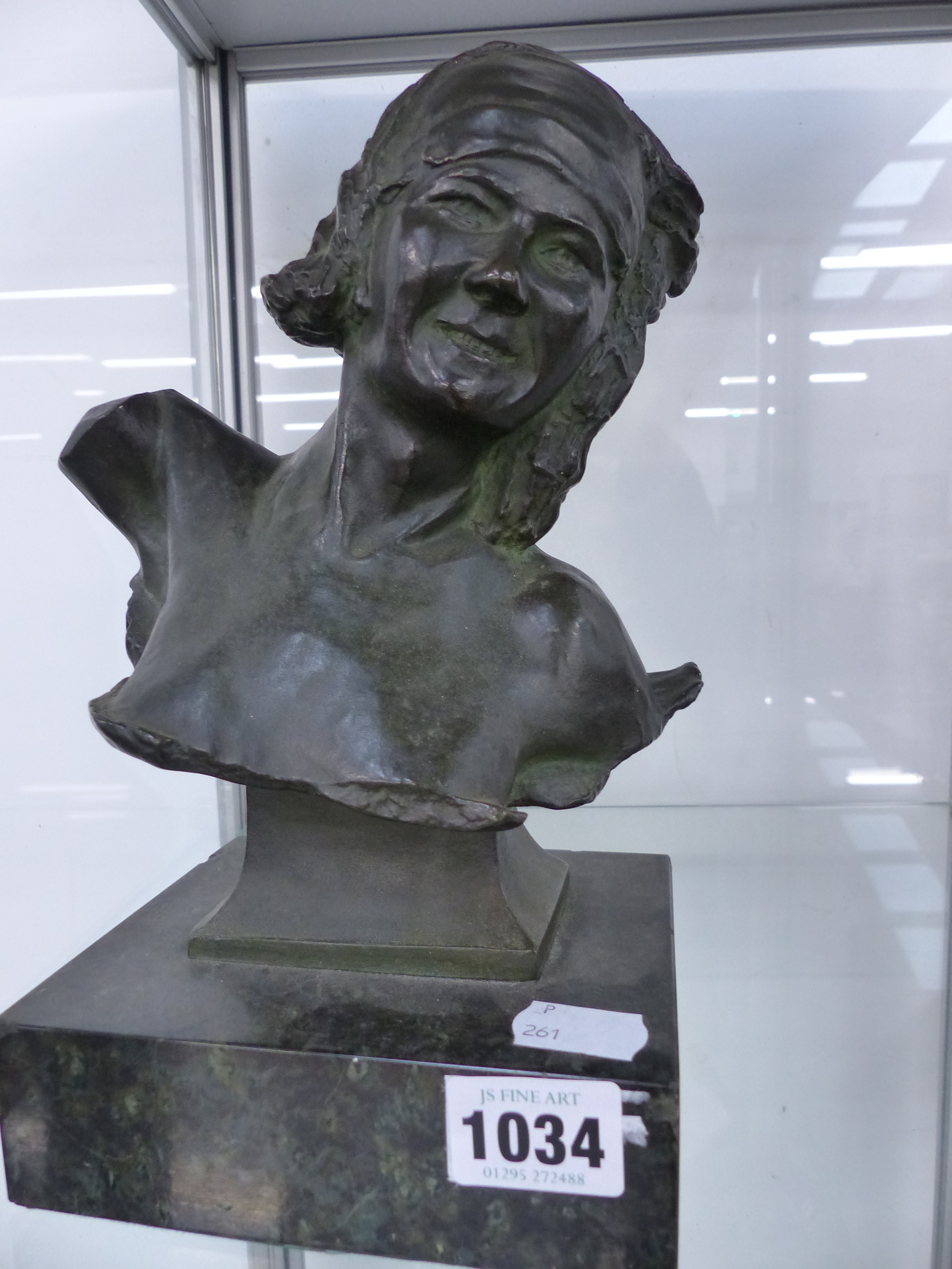 ATTRIBUTED TO SIR WILLIAM REID DICK (1978-1961) A BUST PORTRAIT OF A LADY BRONZE ON MARBLE BASE.
